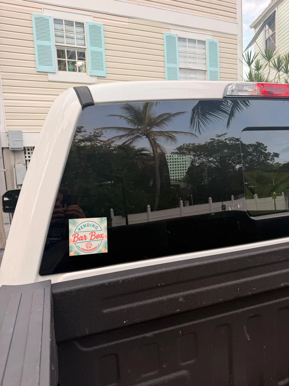 Vending Bar Box decal applied to the rear window of a pickup truck